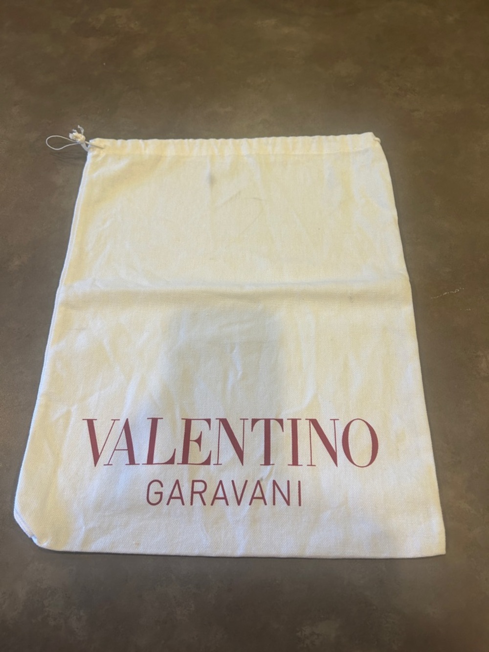 Valentino Garavani Dust Bag in White with Red Logo
